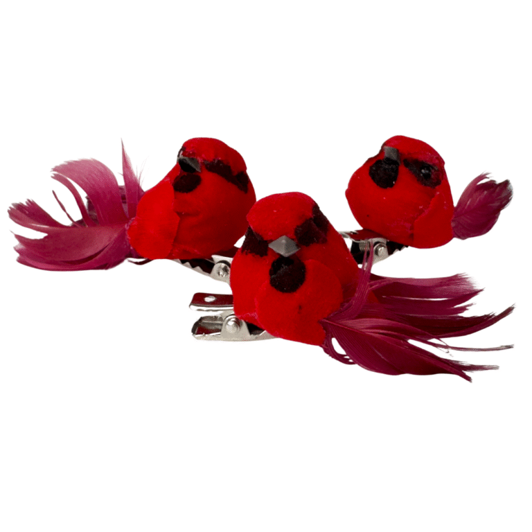 Three miniature red cardinal bird ornaments with black facial markings, burgundy feather tails, and silver metal clips