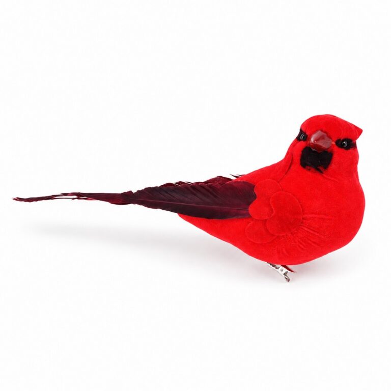 Red artificial cardinal bird with bright red plumage, black facial markings, dark feather wings, and a long tail