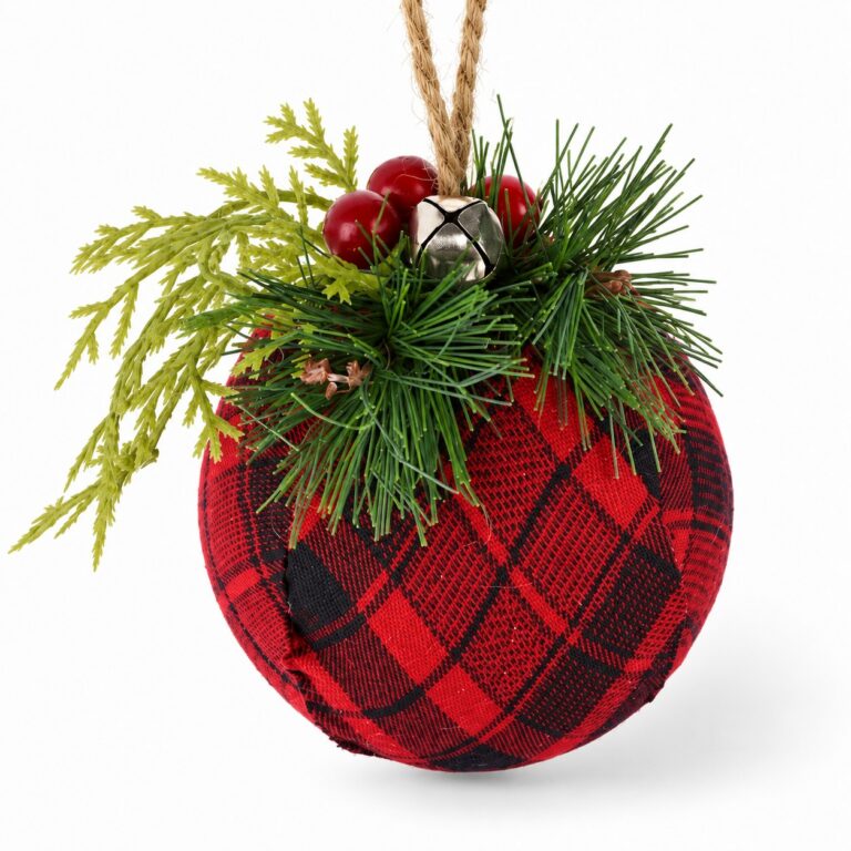 Red and black plaid fabric Christmas ball ornament with evergreen greenery, red berries, silver bell, and jute hanging loop