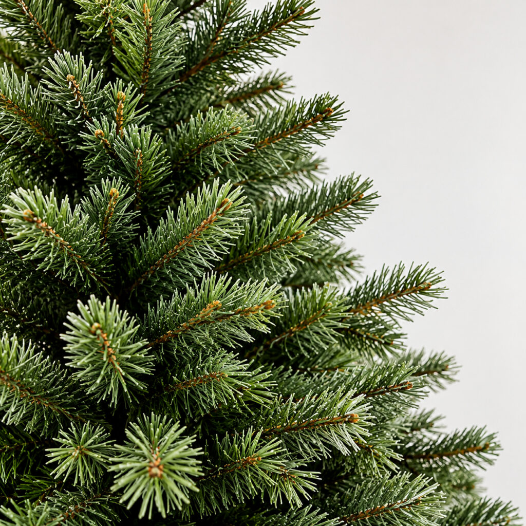 Close-up of classic green artificial Christmas tree branches